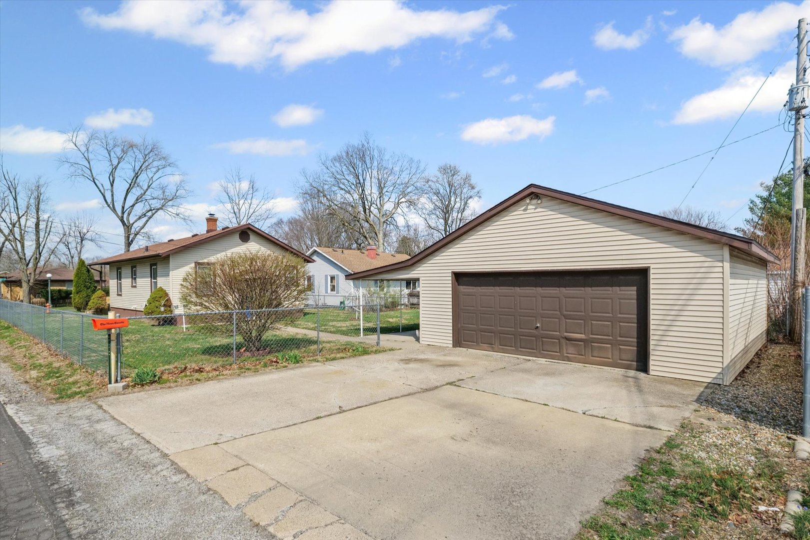 1311 West Hill Street Champaign, IL 61821 - Photo 26 of 27 a view of house with a yard and garage