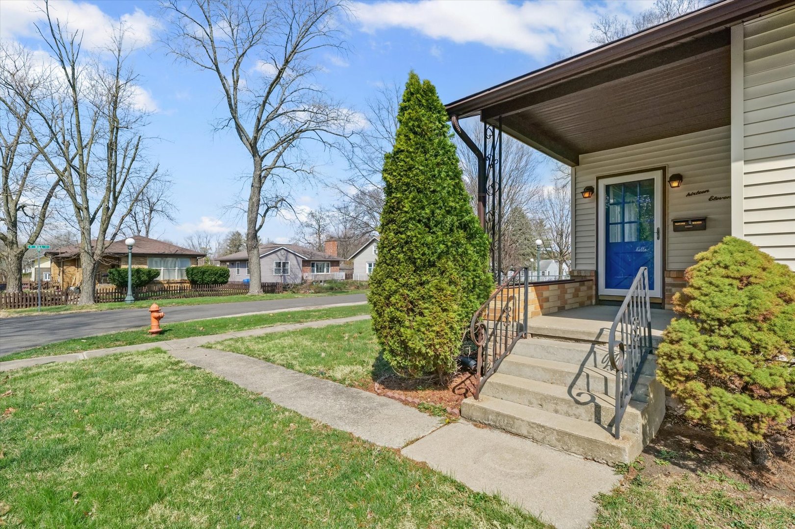 1311 West Hill Street Champaign, IL 61821 - Photo 5 of 27 a view of a house with a yard