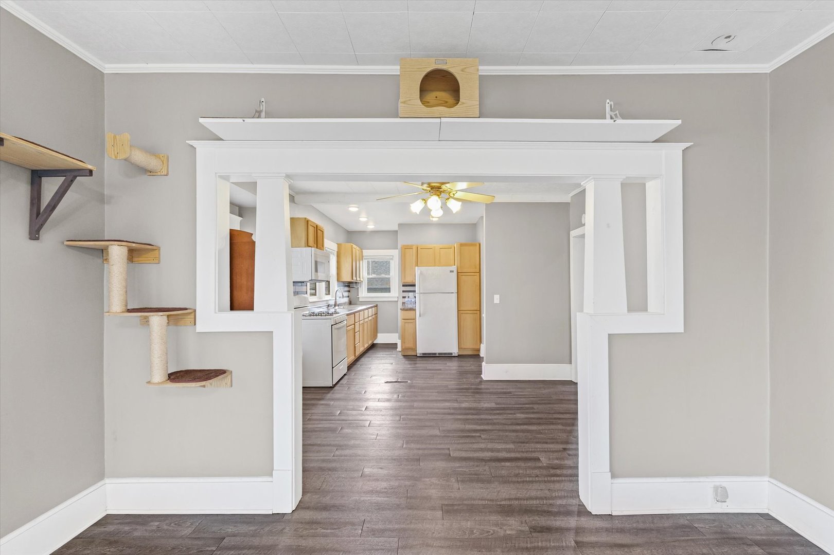 1311 West Hill Street Champaign, IL 61821 - Photo 9 of 27 a view of a hallway view with wooden floor and staircase