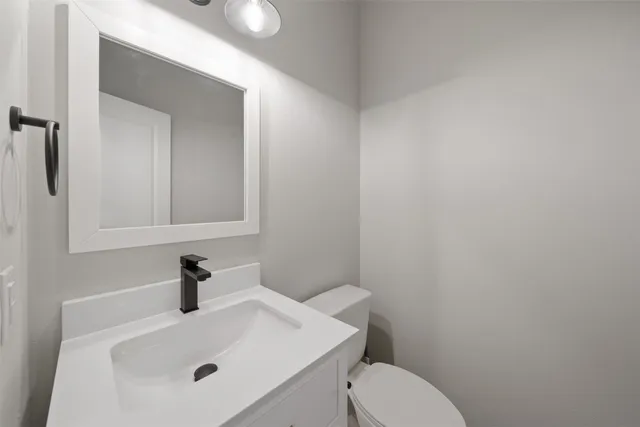 a bathroom with a sink and a toilet