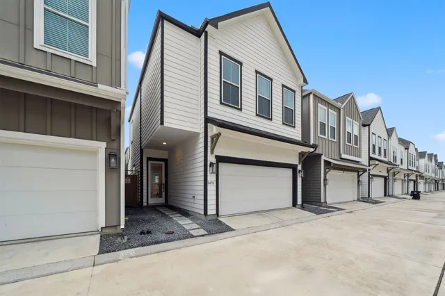 a view of a house with a garage