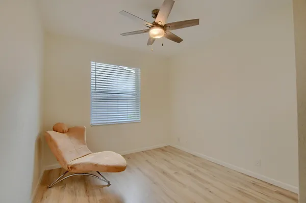 a workspace with furniture and a window