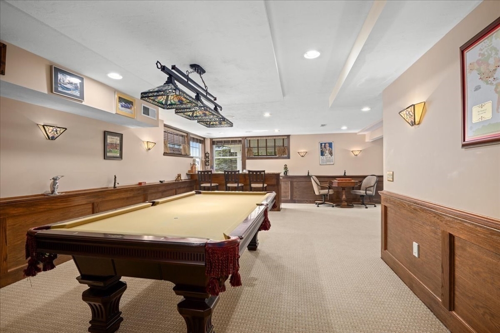 7 Primmett Lane, Unit 7 Worcester, MA 01609 - Photo 28 of 38 a room with furniture and air hockey table