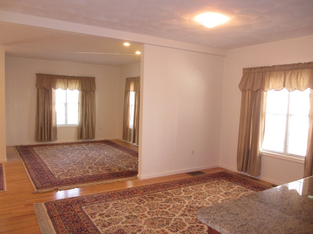 2 Blue Jay Circle, Unit 1 Wakefield, MA 01880 - Photo 3 of 11 a view of an empty room and window