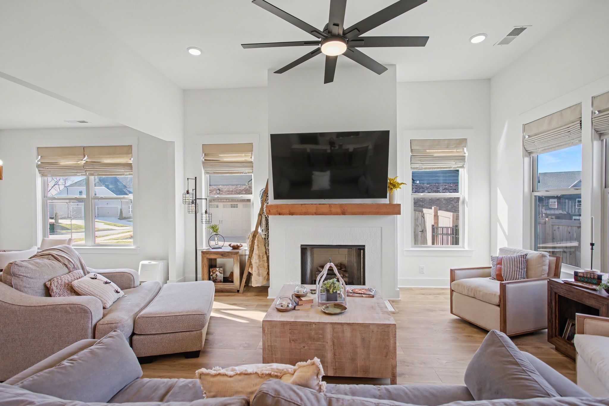 194 Phillips Bend Spring Hill Spring Hill, TN 37174 - Photo 15 of 53 a living room with furniture a fireplace and a flat screen tv