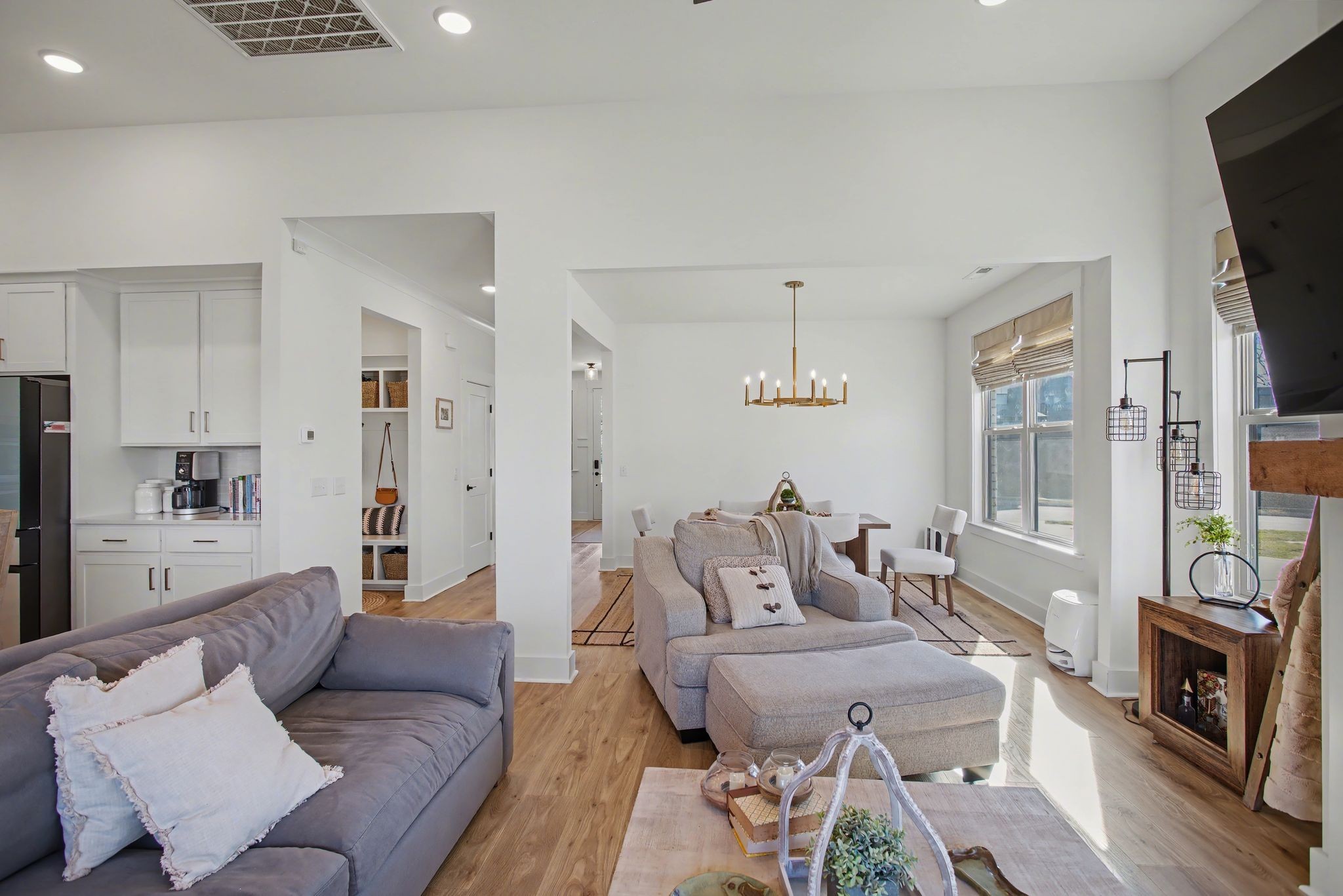 194 Phillips Bend Spring Hill Spring Hill, TN 37174 - Photo 17 of 53 a living room with furniture a flat screen tv and a fireplace