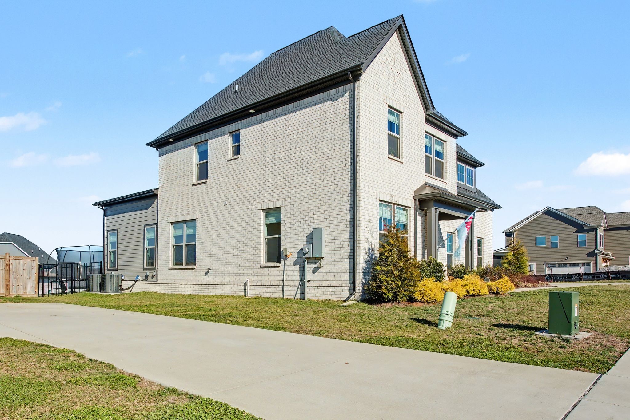 194 Phillips Bend Spring Hill Spring Hill, TN 37174 - Photo 2 of 53 a view of a white house with a yard and plants