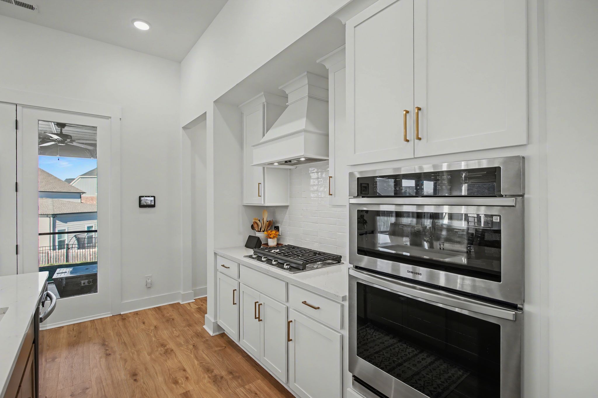 194 Phillips Bend Spring Hill Spring Hill, TN 37174 - Photo 21 of 53 a kitchen with stainless steel appliances white cabinets and a stove