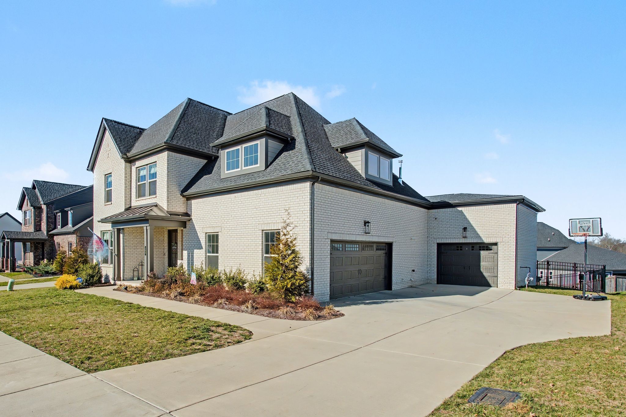 194 Phillips Bend Spring Hill Spring Hill, TN 37174 - Photo 3 of 53 a front view of a house with garden