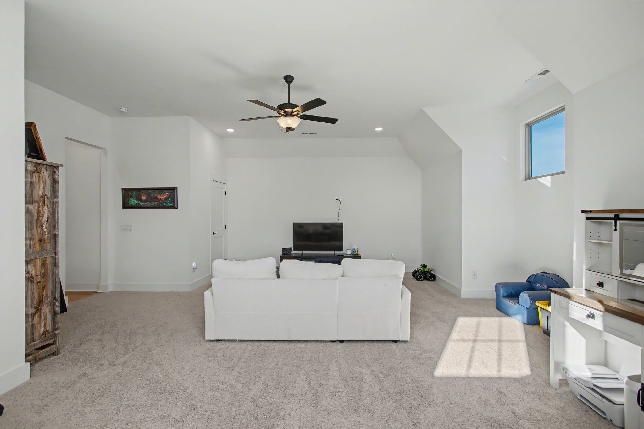 194 Phillips Bend Spring Hill Spring Hill, TN 37174 - Photo 32 of 53 a living room with furniture and a flat screen tv
