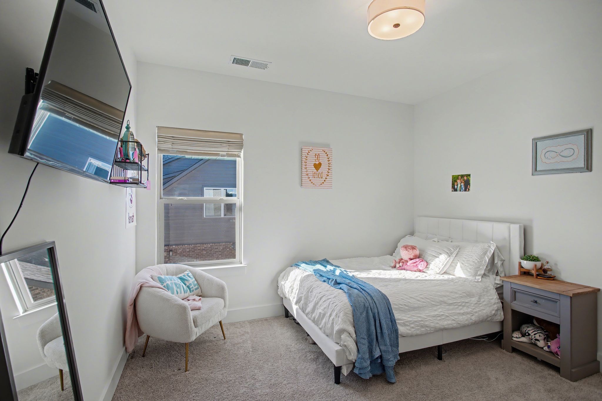 194 Phillips Bend Spring Hill Spring Hill, TN 37174 - Photo 35 of 53 a bedroom with a bed and a window