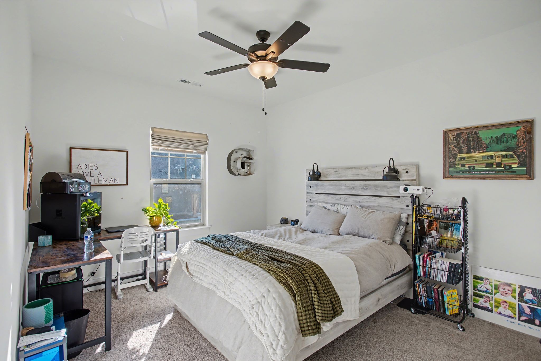 194 Phillips Bend Spring Hill Spring Hill, TN 37174 - Photo 38 of 53 a bedroom with a bed a window and a potted plant on a dresser