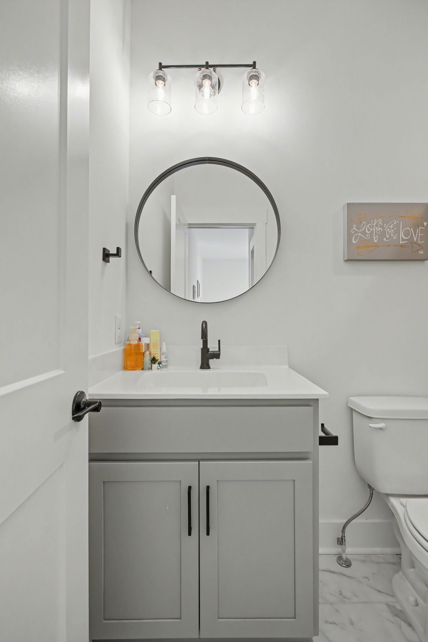 194 Phillips Bend Spring Hill Spring Hill, TN 37174 - Photo 42 of 53 a bathroom with a sink a toilet and mirror