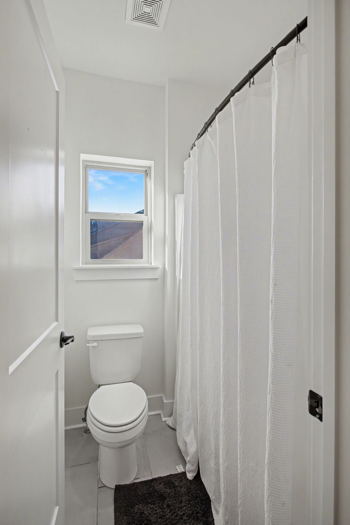 194 Phillips Bend Spring Hill Spring Hill, TN 37174 - Photo 46 of 53 a bathroom with a toilet and a shower curtain