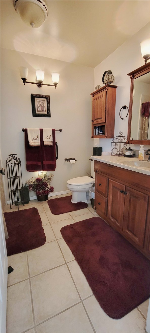 5322 Coney Road Los Angeles, CA 90032 - Photo 12 of 22 a living room with lots of wooden furniture and kitchen view