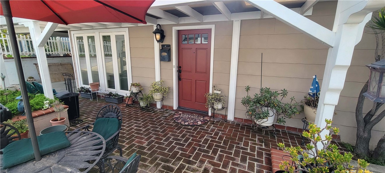 5322 Coney Road Los Angeles, CA 90032 - Photo 2 of 22 a couple of table and chairs in the patio