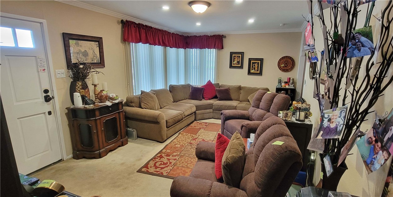 5322 Coney Road Los Angeles, CA 90032 - Photo 22 of 22 a living room with furniture and a flat screen tv