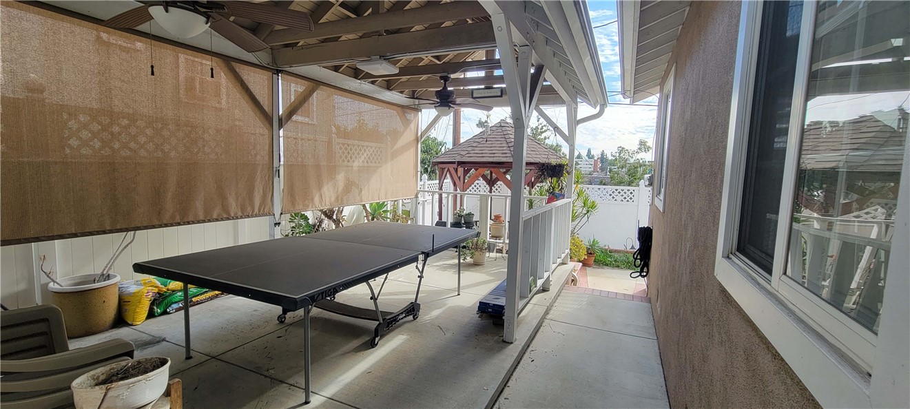 5322 Coney Road Los Angeles, CA 90032 - Photo 4 of 22 a view of a patio with table and chairs with barbeque grill and floor