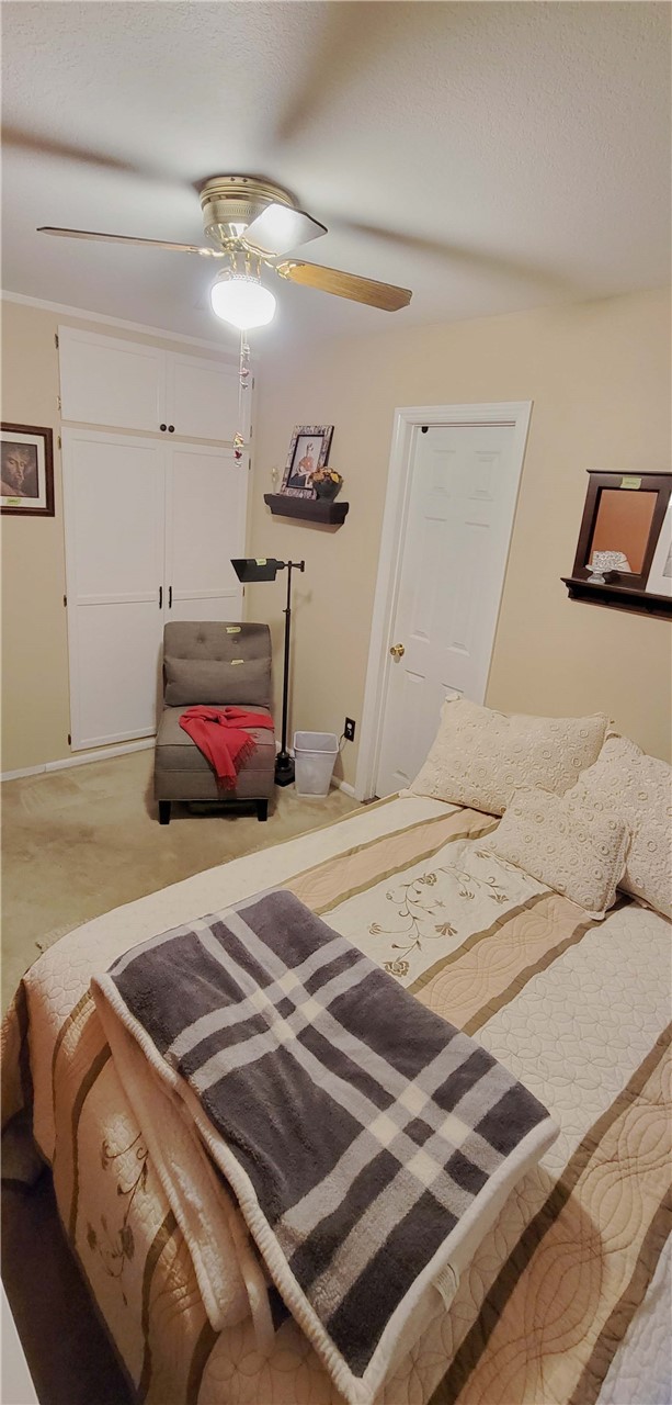 5322 Coney Road Los Angeles, CA 90032 - Photo 9 of 22 a bedroom with a bed and a lamp