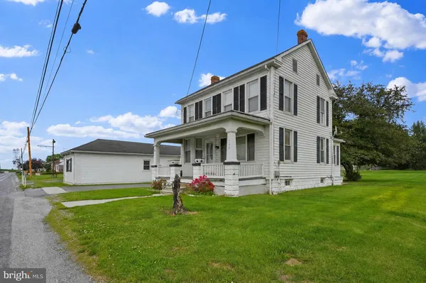 a front view of house with yard