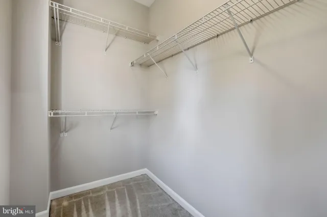 a view of a room with racks on the wall