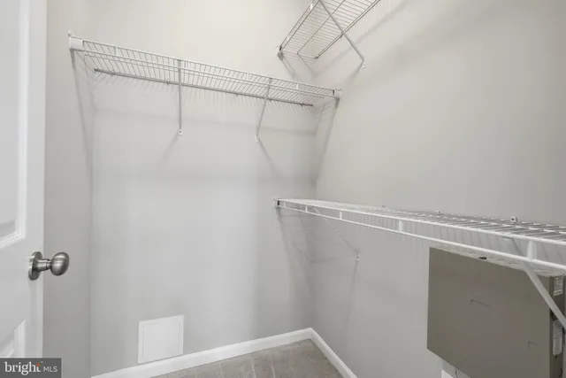 a view of a room with racks on the wall