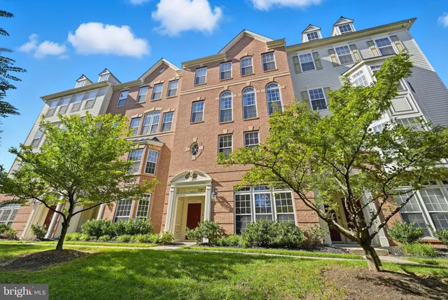 front view of a building with a yard