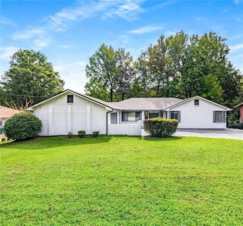 a house view with a garden space