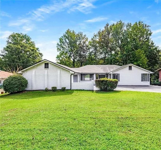 a house view with a garden space