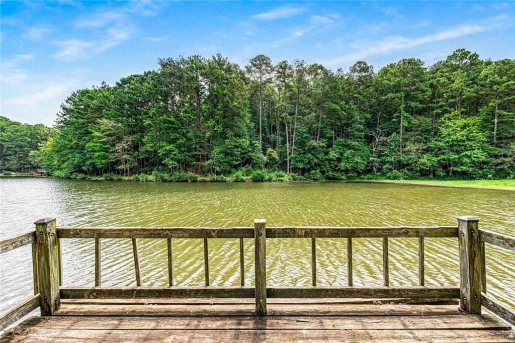 234 Shadow Lake Drive Southwest Lilburn, GA 30047 - Photo 11 of 36 a view of a swimming pool and an outdoor space