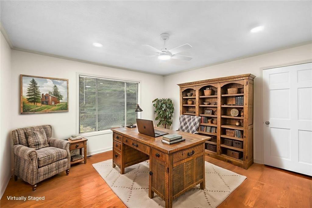 234 Shadow Lake Drive Southwest Lilburn, GA 30047 - Photo 17 of 36 a living room with furniture and a window