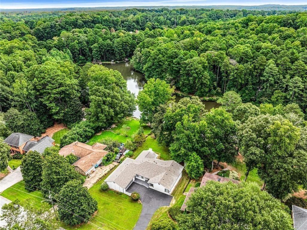 234 Shadow Lake Drive Southwest Lilburn, GA 30047 - Photo 36 of 36 an aerial view of residential house with outdoor space and trees all around