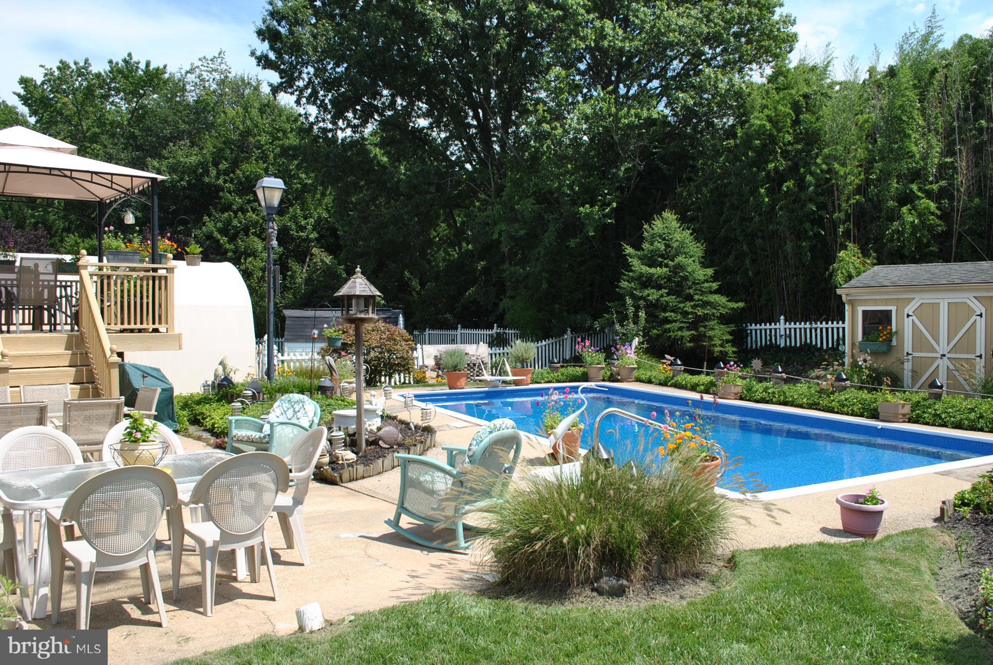 9205 Sandra Park Road Perry Hall, MD 21128 - Photo 3 of 30 BACKYARD OASIS W/POOL BACKS TO PRIVATE VIEWS