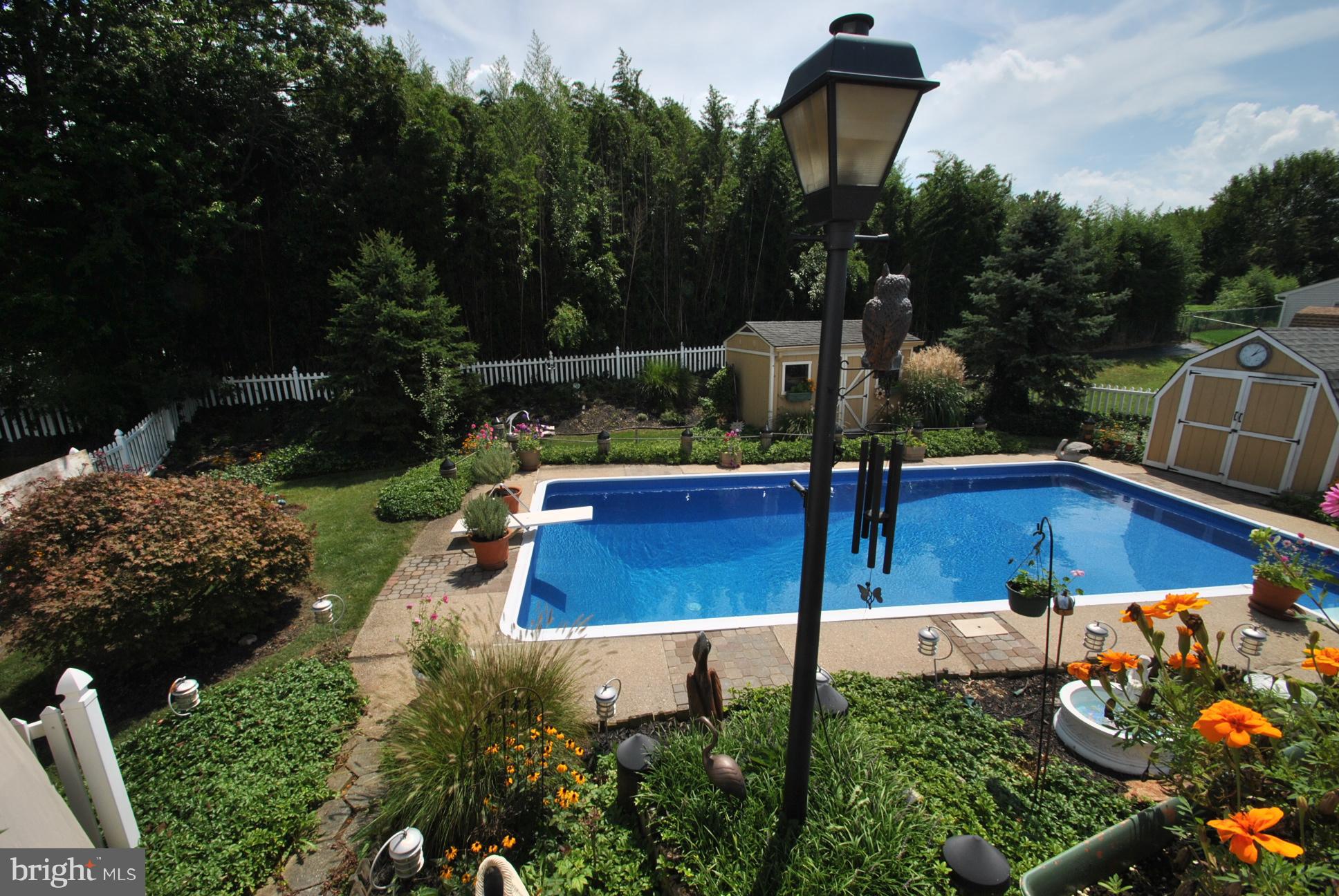 9205 Sandra Park Road Perry Hall, MD 21128 - Photo 4 of 30 BACKYARD OASIS W/POOL BACKS TO PRIVATE VIEWS