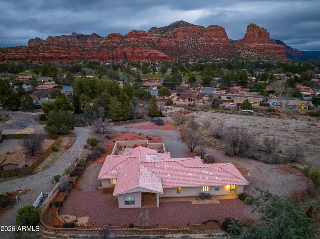an aerial view of residential houses and outdoor space