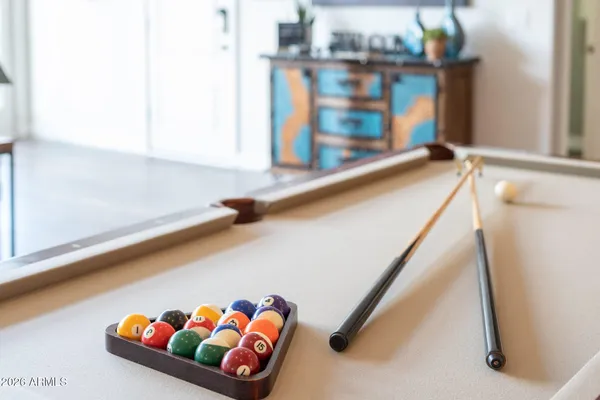 a bed room with a bed and a lamp