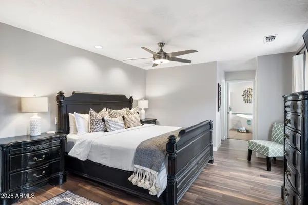 a swimming pool with outdoor seating