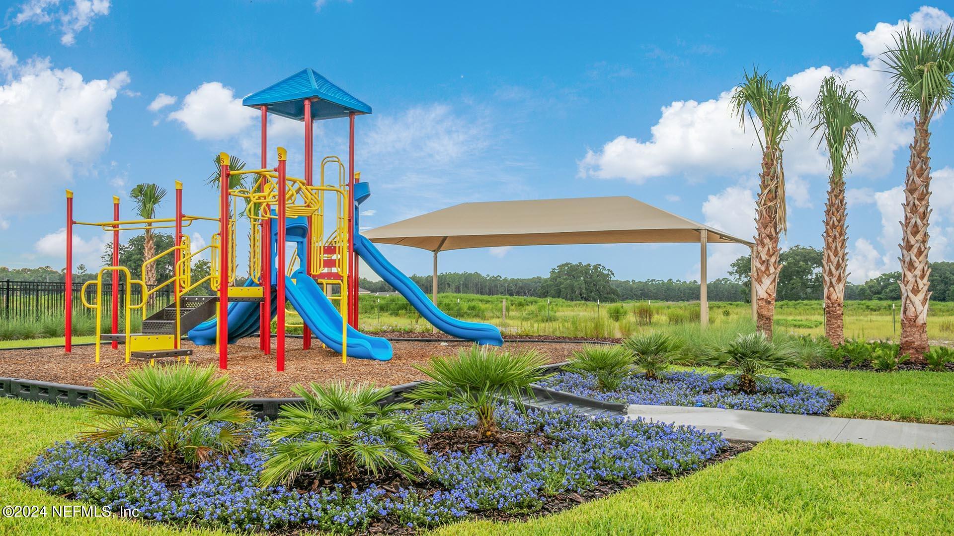 425 Orellana Road St. Augustine, FL 32084 - Photo 34 of 57 a view of park with swings and slides
