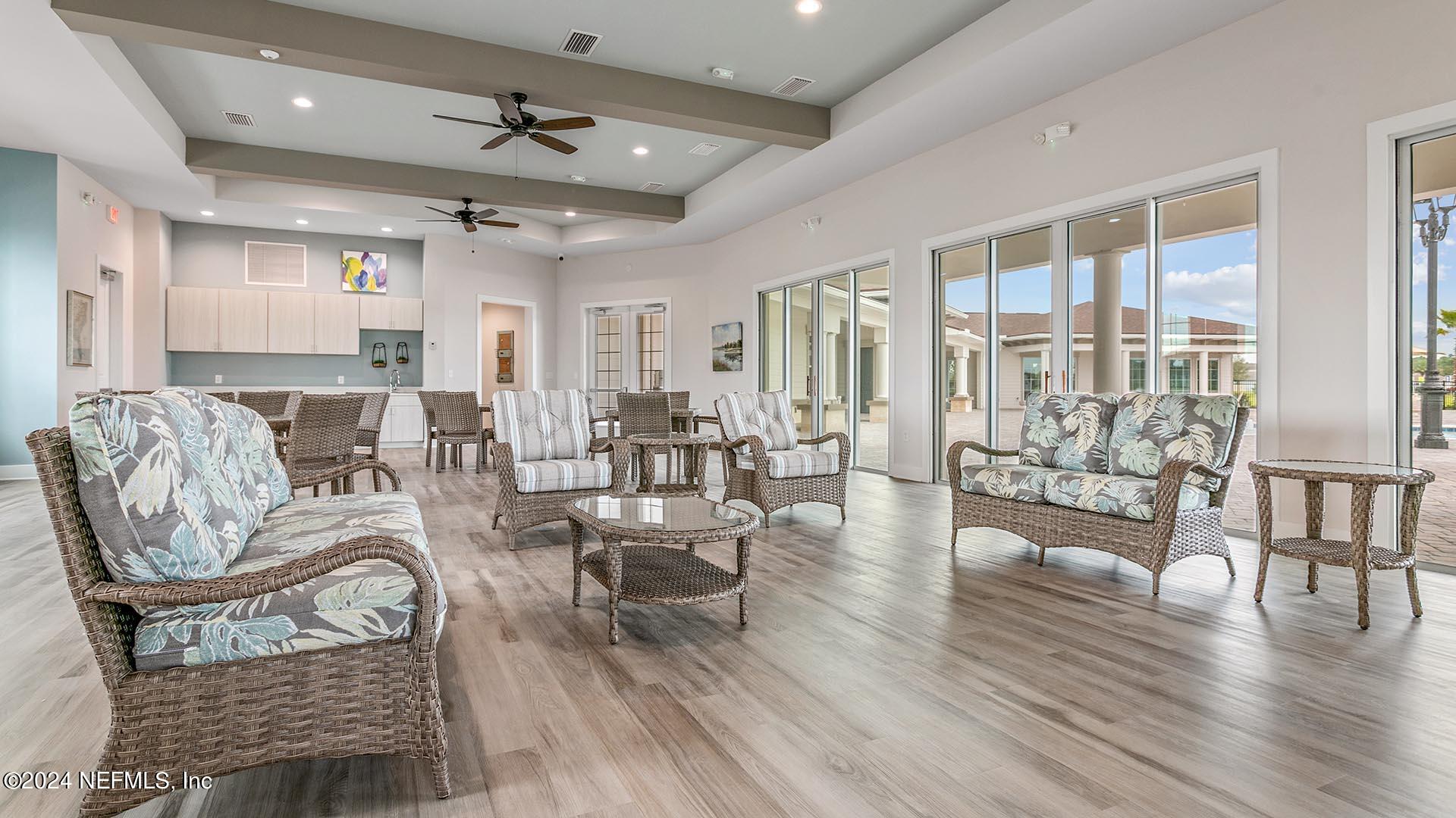 425 Orellana Road St. Augustine, FL 32084 - Photo 35 of 57 a living room with furniture and wooden floor