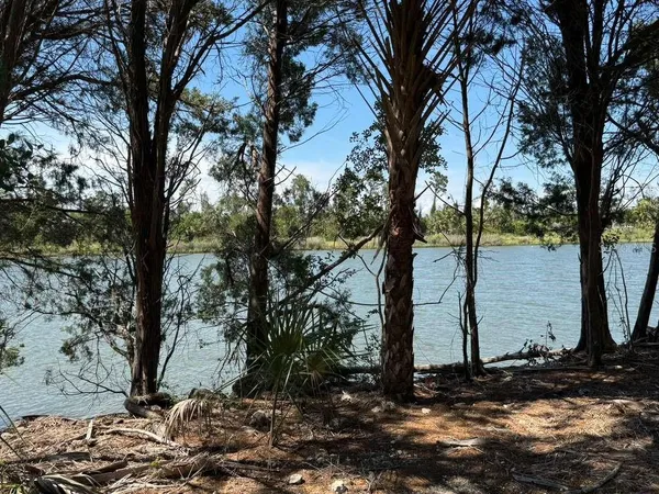 a view of a lake from a balcony