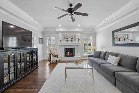a kitchen with sink stove and refrigerator