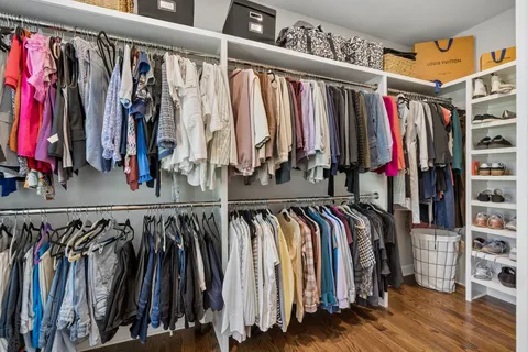 a view of a room with gym equipment and a window
