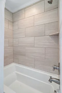 a room with a sink and a mirror