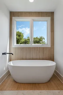 a view of a bathtub in a room