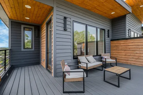 a building outdoor space with patio furniture