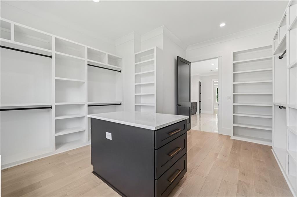 333 Sims Bridge Road Commerce, GA 30530 - Photo 37 of 71 a kitchen with a cabinets and a stove top oven