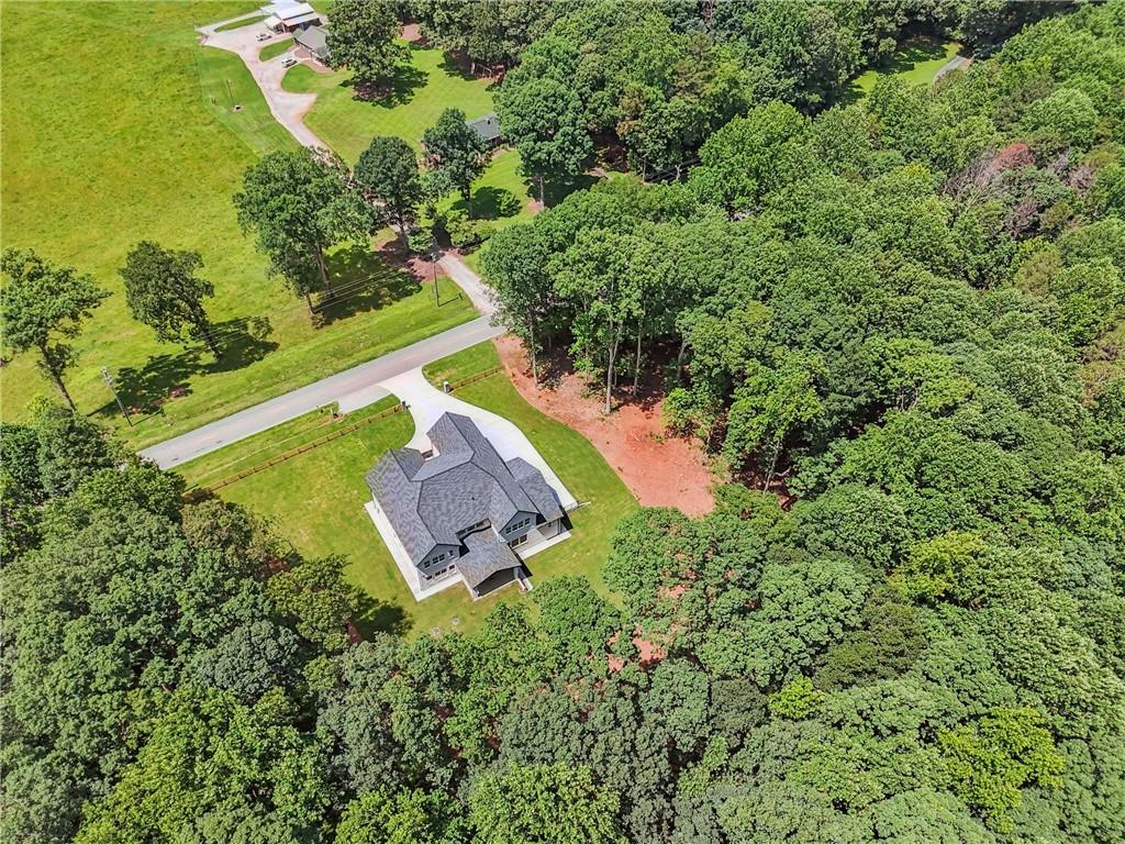 333 Sims Bridge Road Commerce, GA 30530 - Photo 70 of 71 an aerial view of a house with a garden