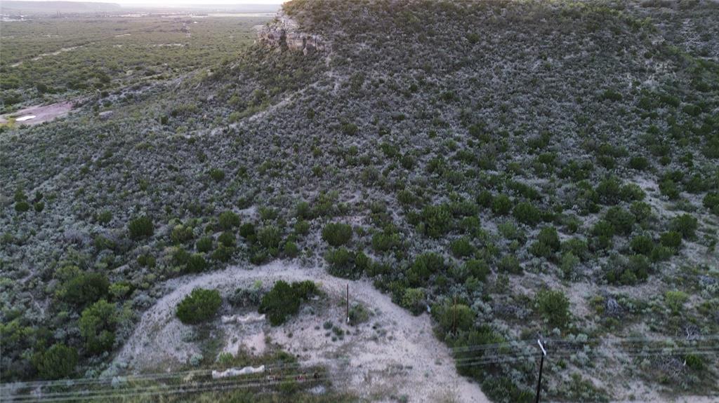 925 Highway 83 Junction, TX 76849 - Photo 12 of 27 a view of a field with trees in background