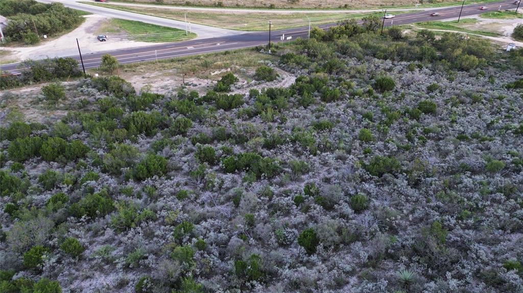 925 Highway 83 Junction, TX 76849 - Photo 14 of 27 an aerial view of a house with a yard