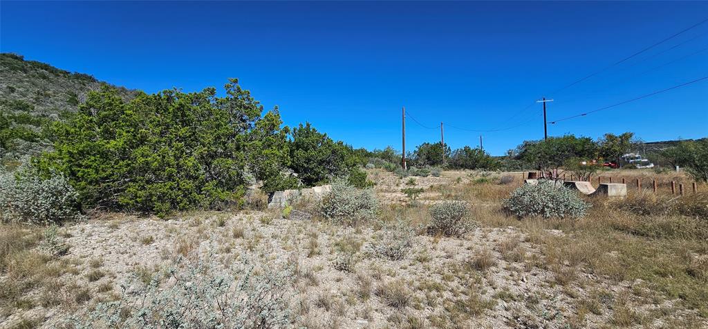 925 Highway 83 Junction, TX 76849 - Photo 24 of 27 a view of a field of grass and trees